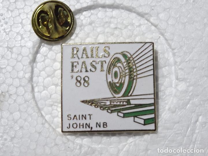 Pin's de collection: PIN DE TRENES FERROCARRILES. CANAD&Aacute; ESTADOS UNIDOS. RAILS EAST 1988 SAINT JOHN, NB