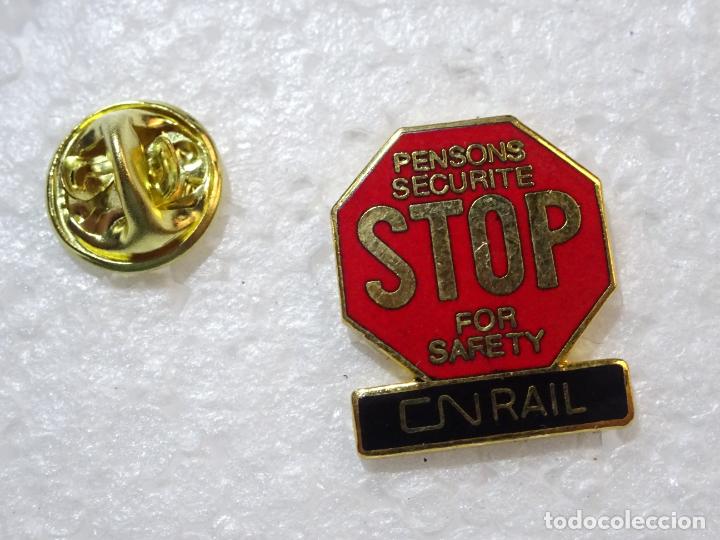 Pin's de collection: PIN DE TRENES FERROCARRILES. CANAD&Aacute; ESTADOS UNIDOS. SEGURIDAD FERROVIARIA STOP SE&Ntilde;AL CN RAIL