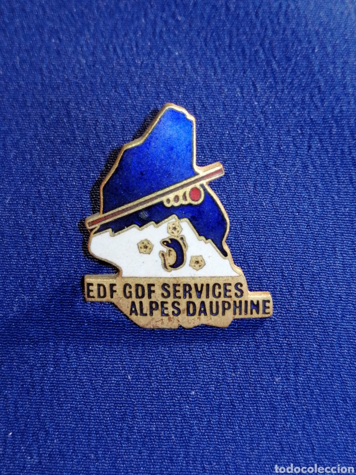 Pin's de collection: ESQU&Iacute; EDF GOF SERVICES ALPES DAUPHINE PIN