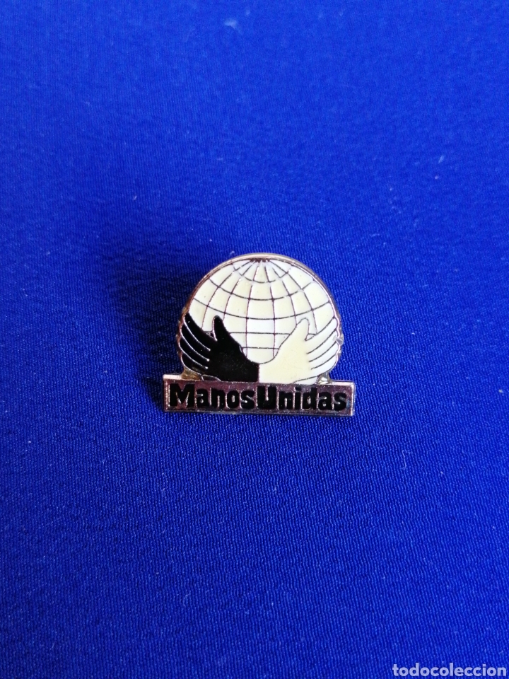 Sammlung von Pins: MANOS UNIDAS PIN