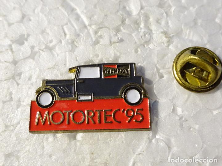 Pins de colecci&oacute;n: PIN DE COCHES MOTOS. CHAMPION BUJ&Iacute;AS. MOTORTEC 95