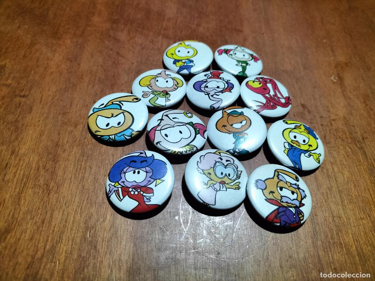Sammlung von Pins: SNORKEL. VARIADOS. DIBUJOS. 12 CHAPAS. PIN. 0,31 MM. DETR&Aacute;S MET&Aacute;LICA. SIN USO. DIFICIL