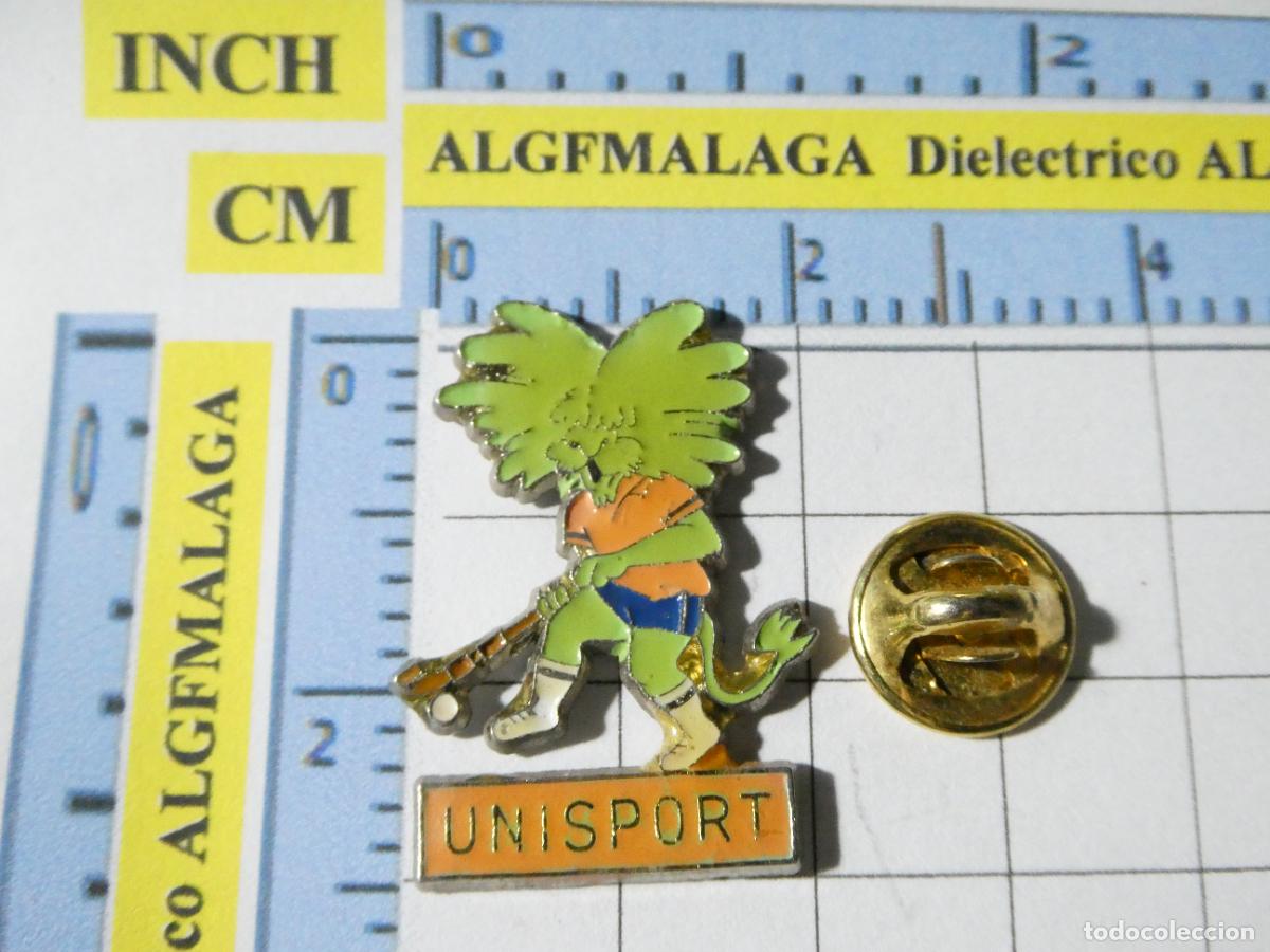 Pin's de collection: PIN DE DEPORTES. HOCKEY HIERBA UNISPORT. MASCOTA LE&Oacute;N