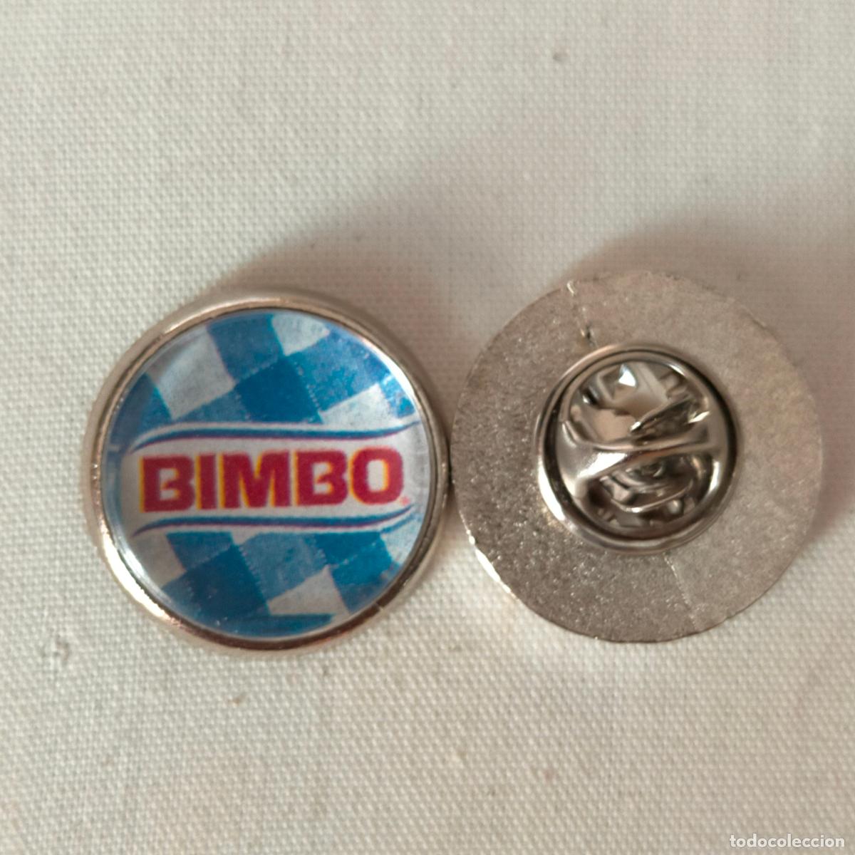Pin's de collection: PIN REDONDO METAL - publicitario DULCES Y PAN DE MOLDE MARCA BIMBO