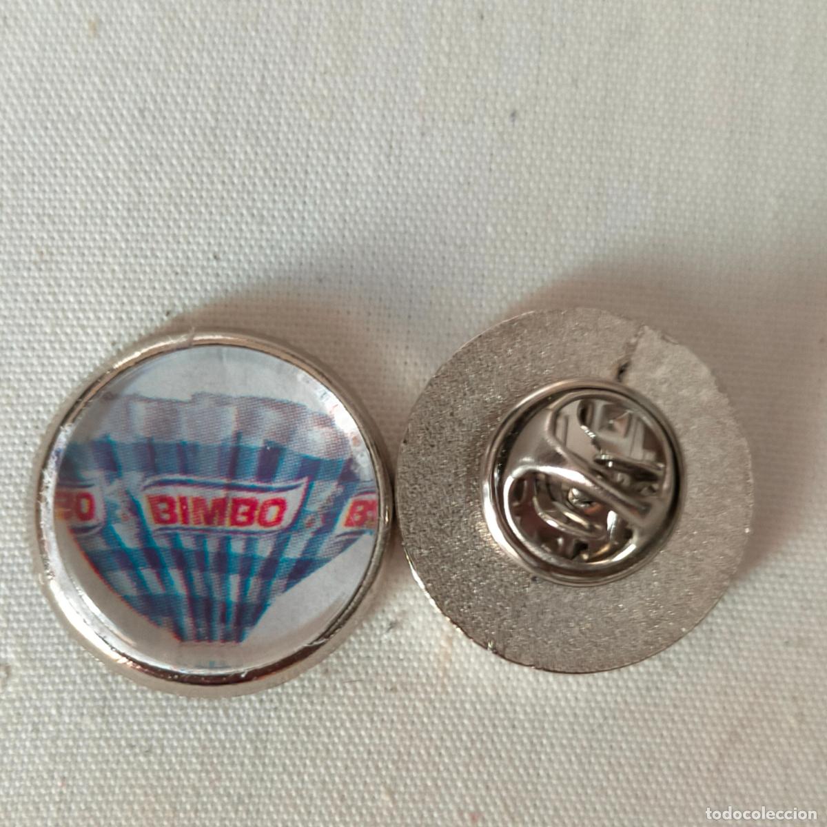 Pin's de collection: PIN REDONDO METAL - publicitario DULCES Y PAN DE MOLDE MARCA BIMBO