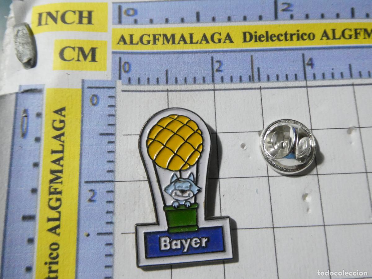 Pin's de collection: PIN GLOBO AEROST&Aacute;TICO BAYER ZORRO PERRO