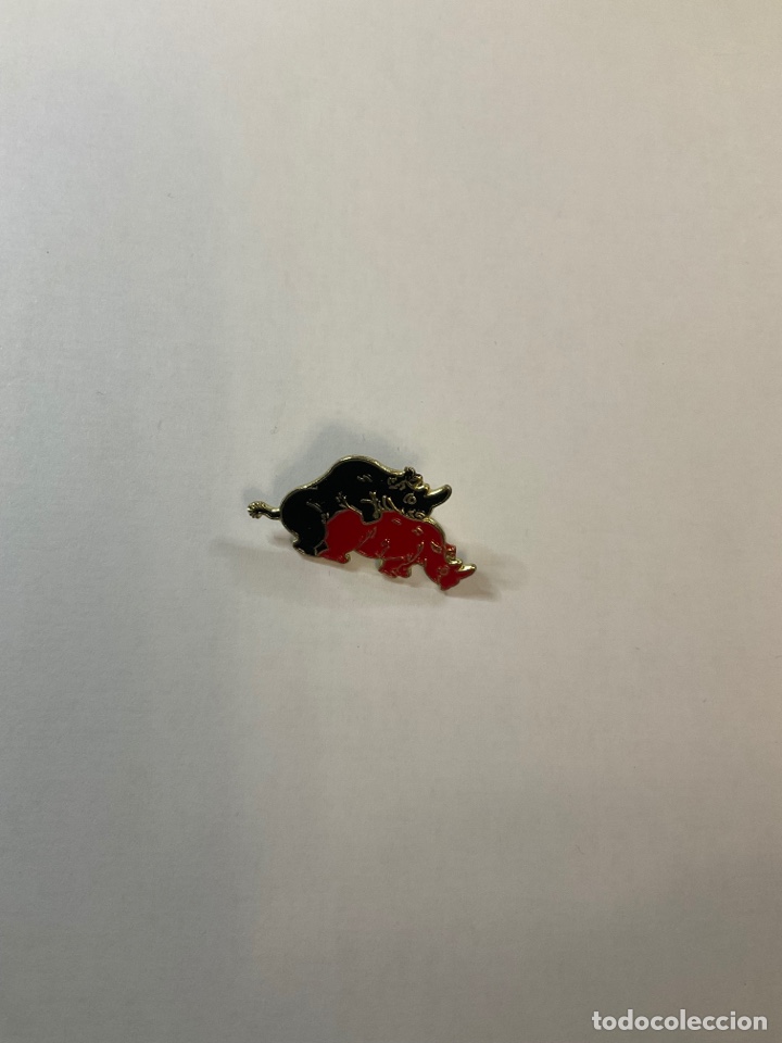 Pin rinocerontes copulando