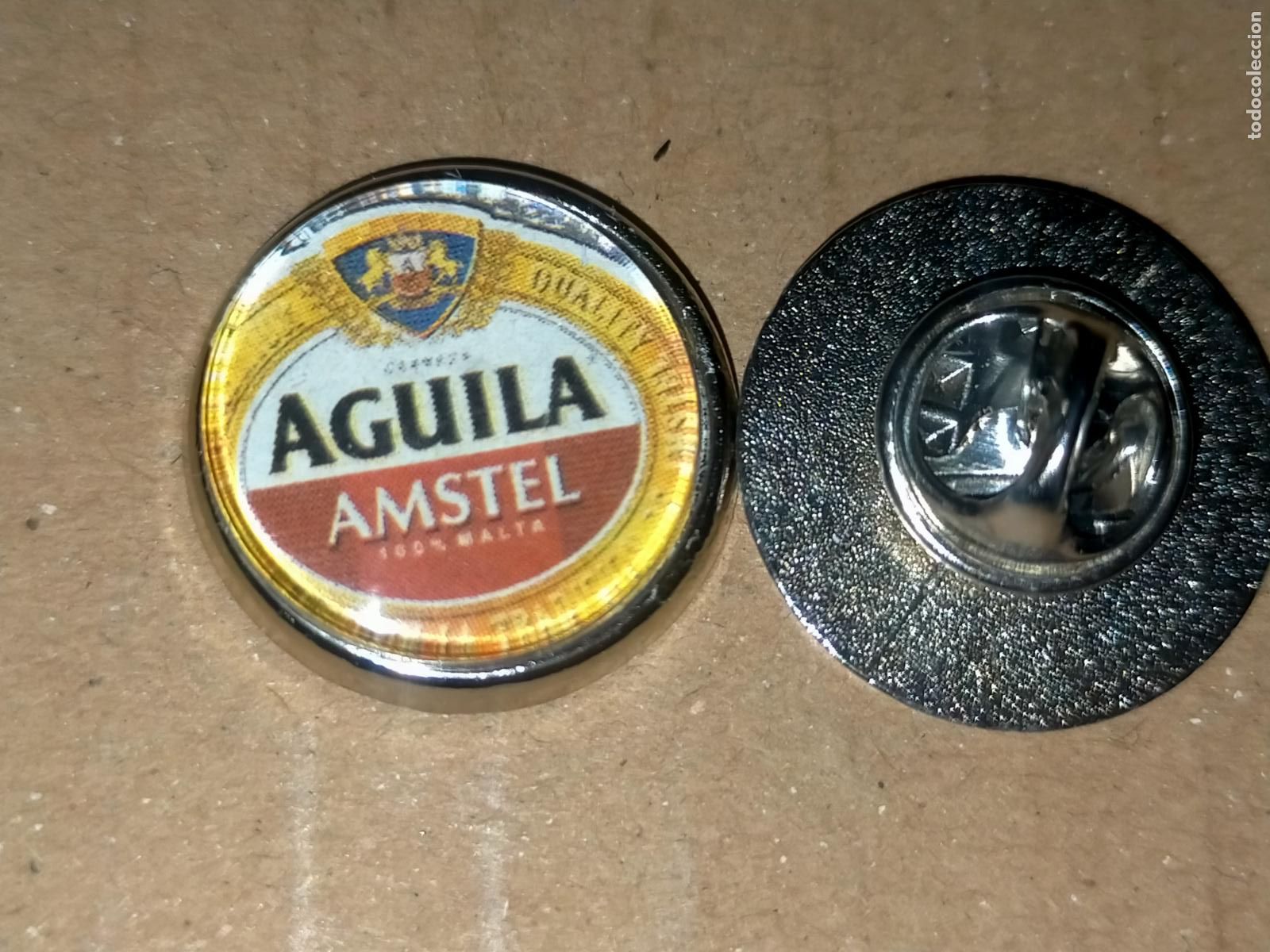 Pin's de collection: PIN REDONDO METAL - cerveza &aacute;guila
