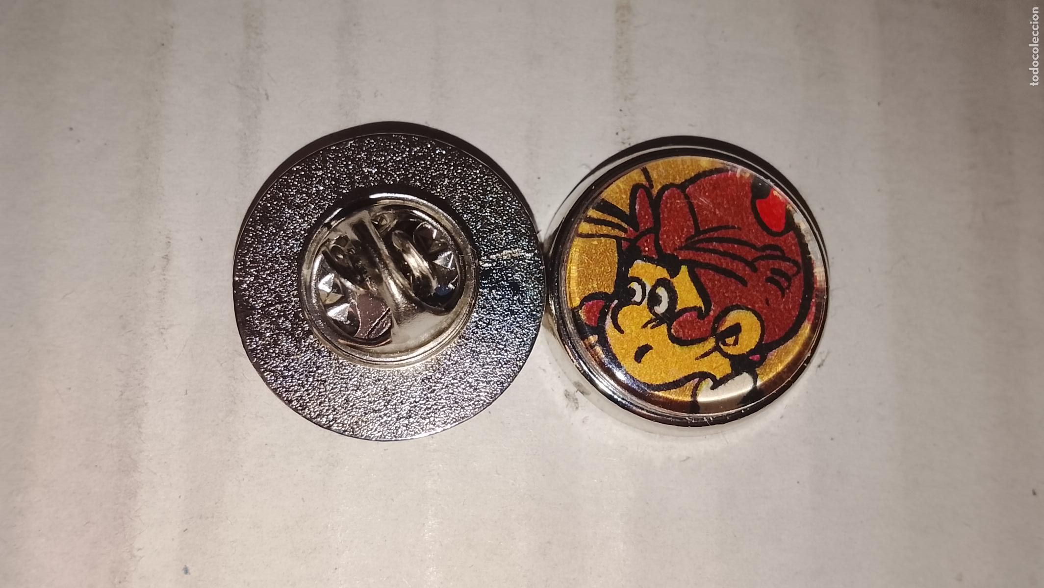 Sammlung von Pins: pin redondo metal - dibujos animados personajes Pipo en de slaapridder