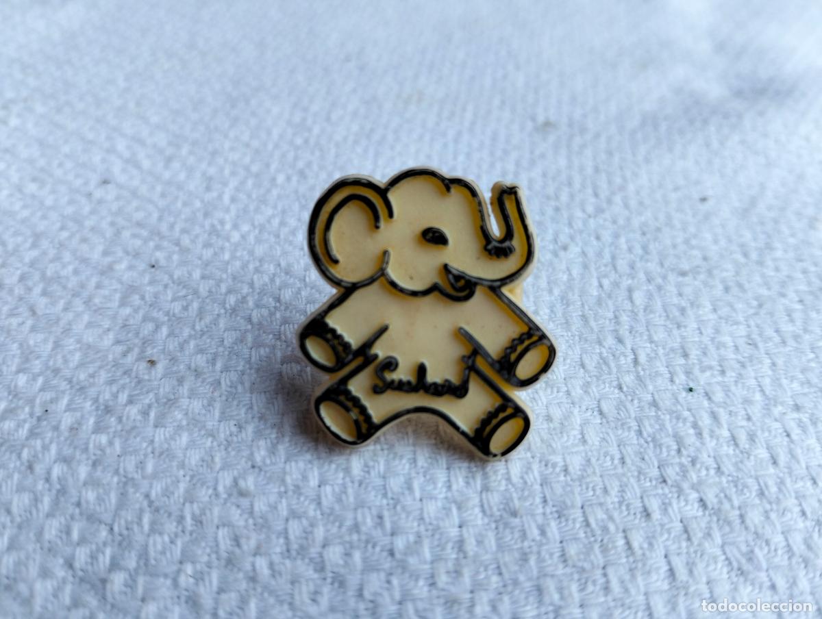 Pin's de collection: Clip roto suchard pin figura de elefante blanco negro vintage
