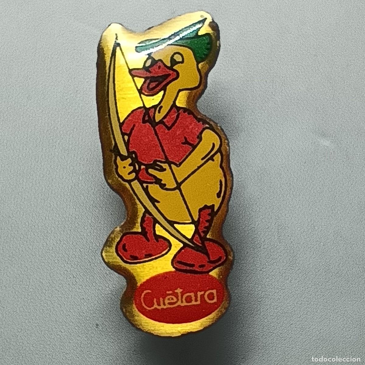 Pins de colecci&oacute;n: Pin Cu&eacute;tara &ndash; personaje publicitario con arco