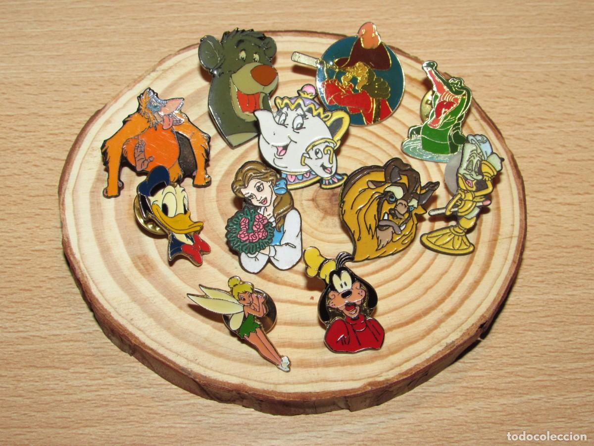 Pins de colecci&oacute;n: Lote 11 pins Disney Bella Bestia Garfio Goofy Donald Campanilla Baloo Louie Tic Tac Potts Lumi&egrave;re