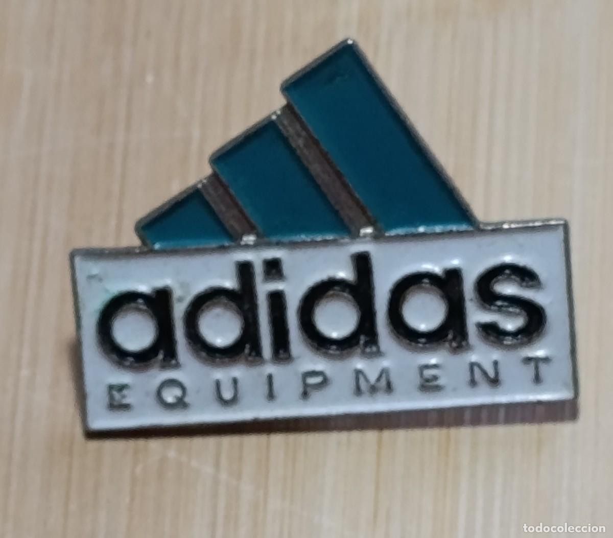 Pin's de collection: Pin Adidas Equipment vintage Logotipo tres bandas verde EQT a&ntilde;os 90