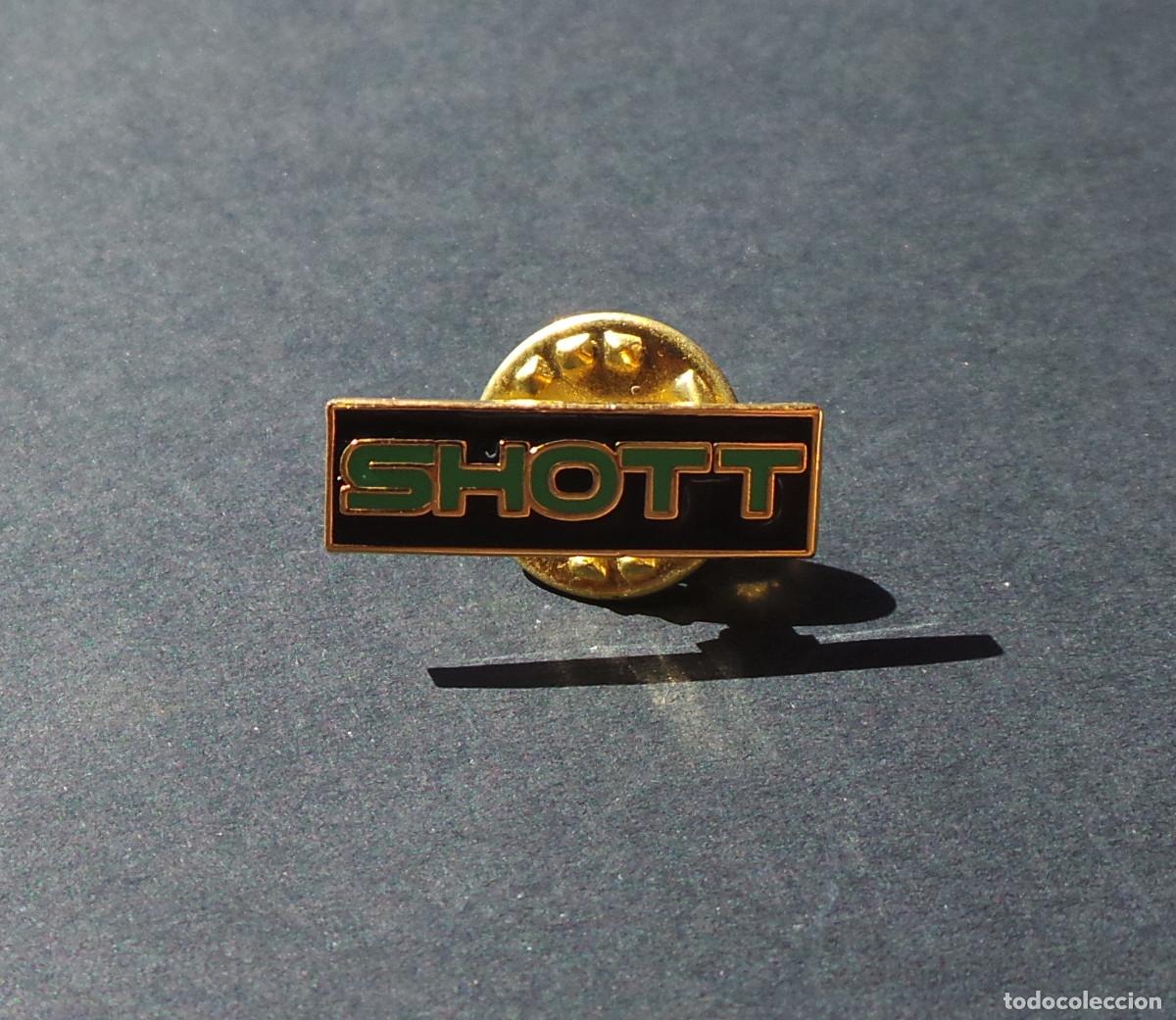 Pin's de collection: PIN DE SOLAPA PROMOCIONAL ORIGINAL DE LA MARCA ESTADOUNIDENSE SHOTT MOBILIARIO MID-CENTURY