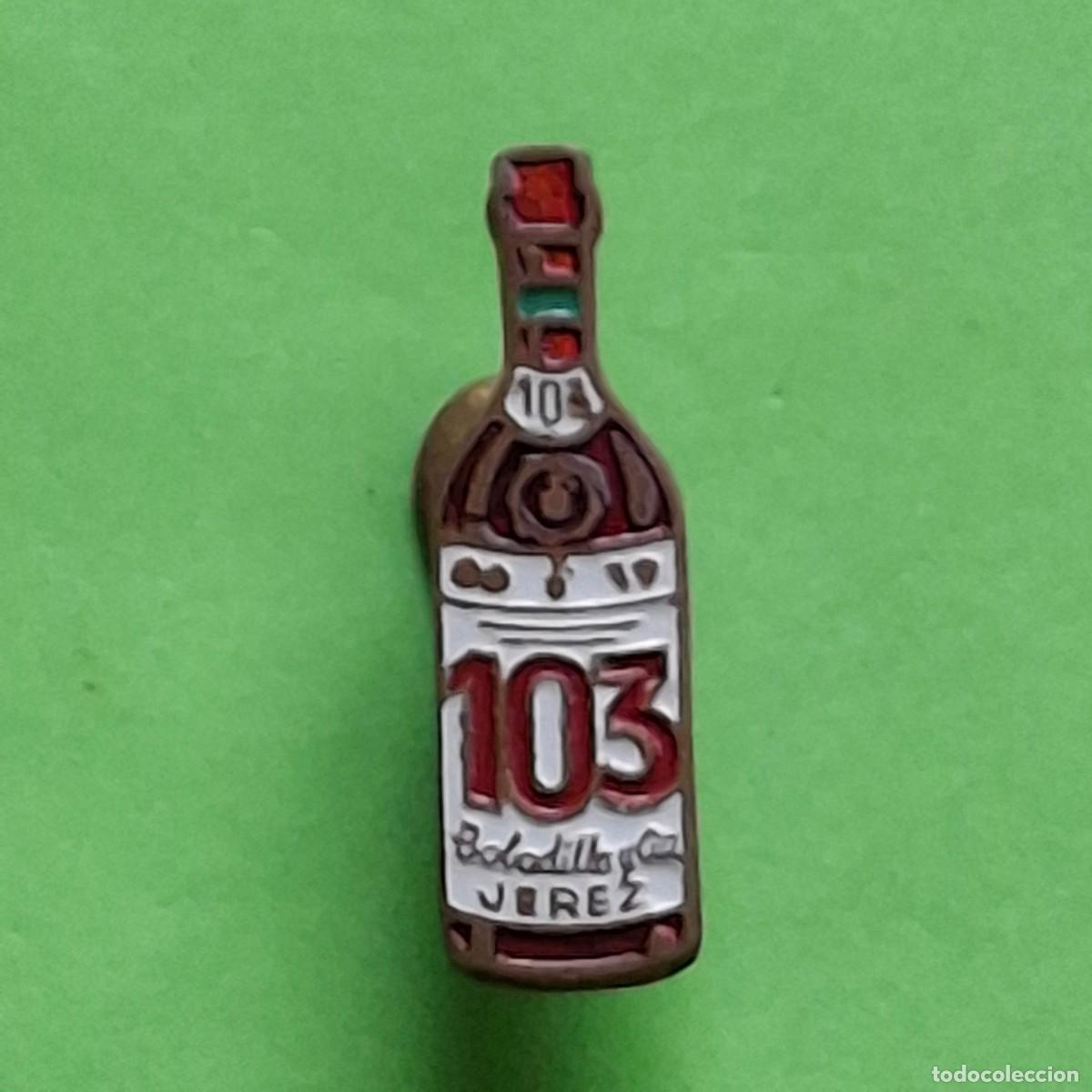 Pin's de collection: PIN INSIGNIA SOLAPA OJAL - 103 BOBADILLA Y CIA JEREZ - LICOR BRANDY CO&Ntilde;AC BOTELLA