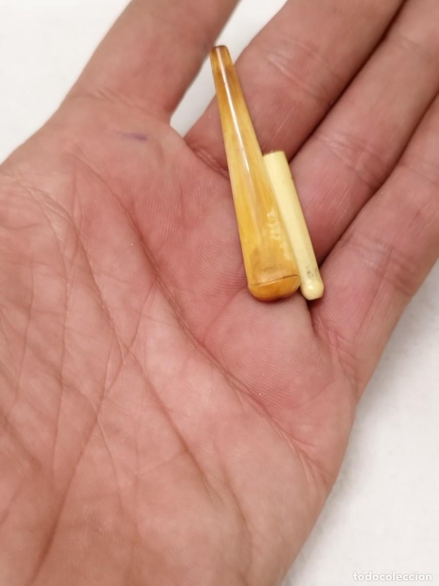 Pipes: Dos antiguas boquillas de fumar a identificar.