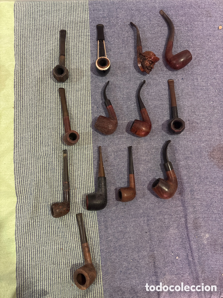Pipes: Lote de 13 pipas de fumar antiguas de madera (brezo), curvas y rectas, con una de cabeza tallada