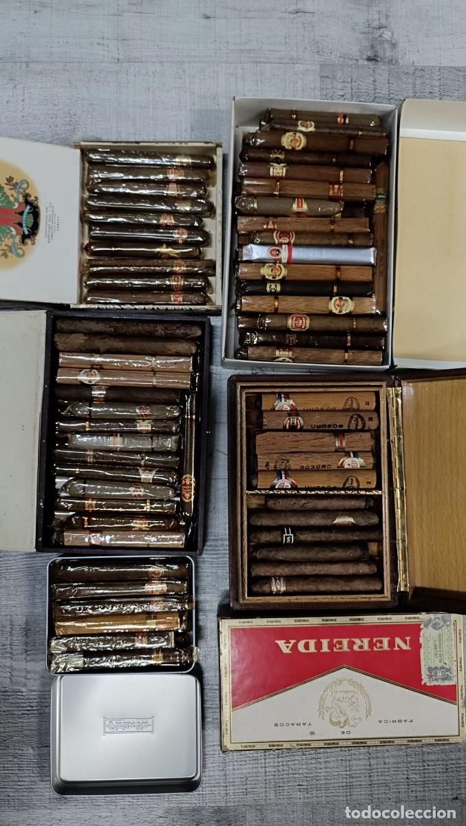 Zigarrenkisten: 73 puros de los a&ntilde;os 60 y 70, 15 habanos sin celofan ni tubo y 58 espa&ntilde;oles en celof&aacute;n.