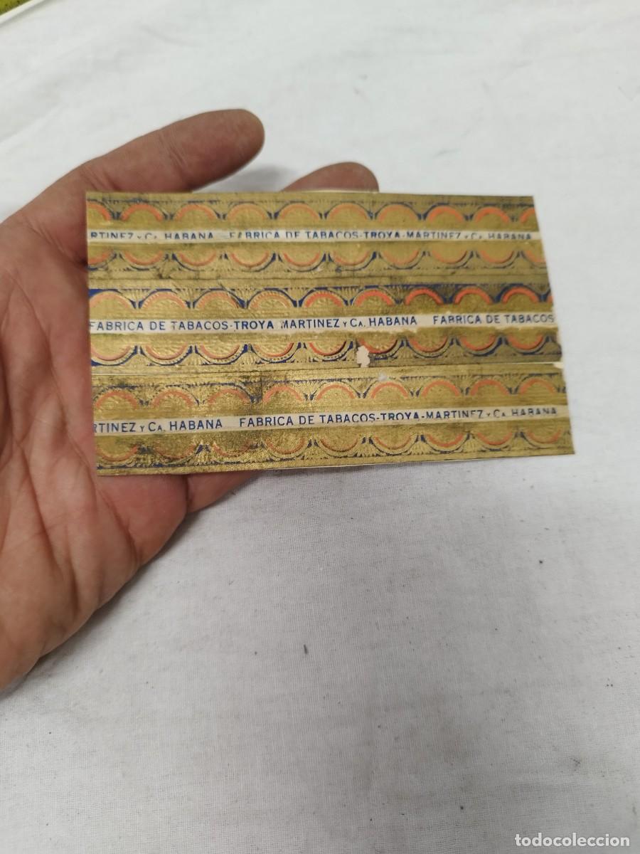 Cajas de puros: Antigua tira de etiquetas/cenefas de puros Troya. F&aacute;brica de Tabacos Mart&iacute;nez y C&iacute;a. La Habana, Cuba