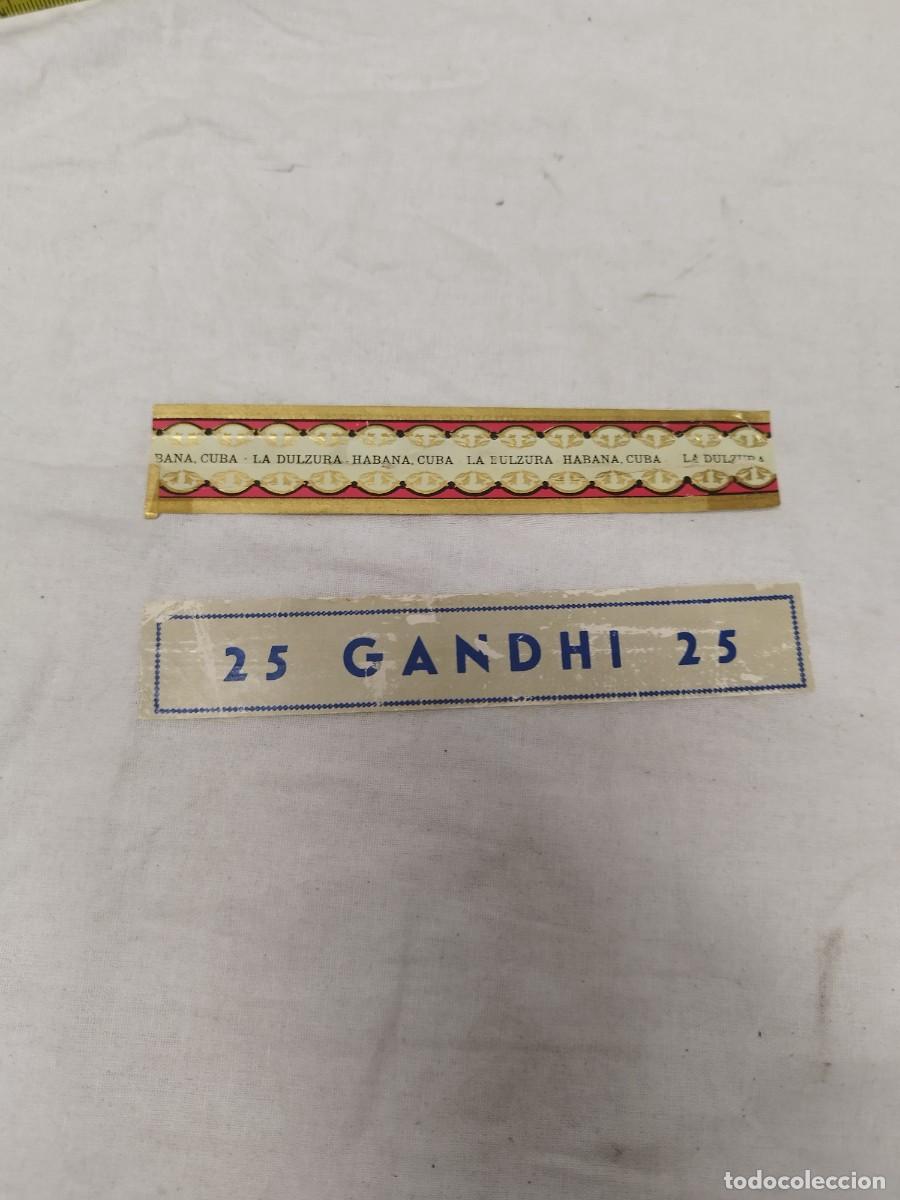 Cajas de puros: Lote de 2 Etiquetas Antiguas de Tabaco - Tira Litogr&aacute;fica La Dulzura Habana y Vitola Gandhi 25&rdquo;.