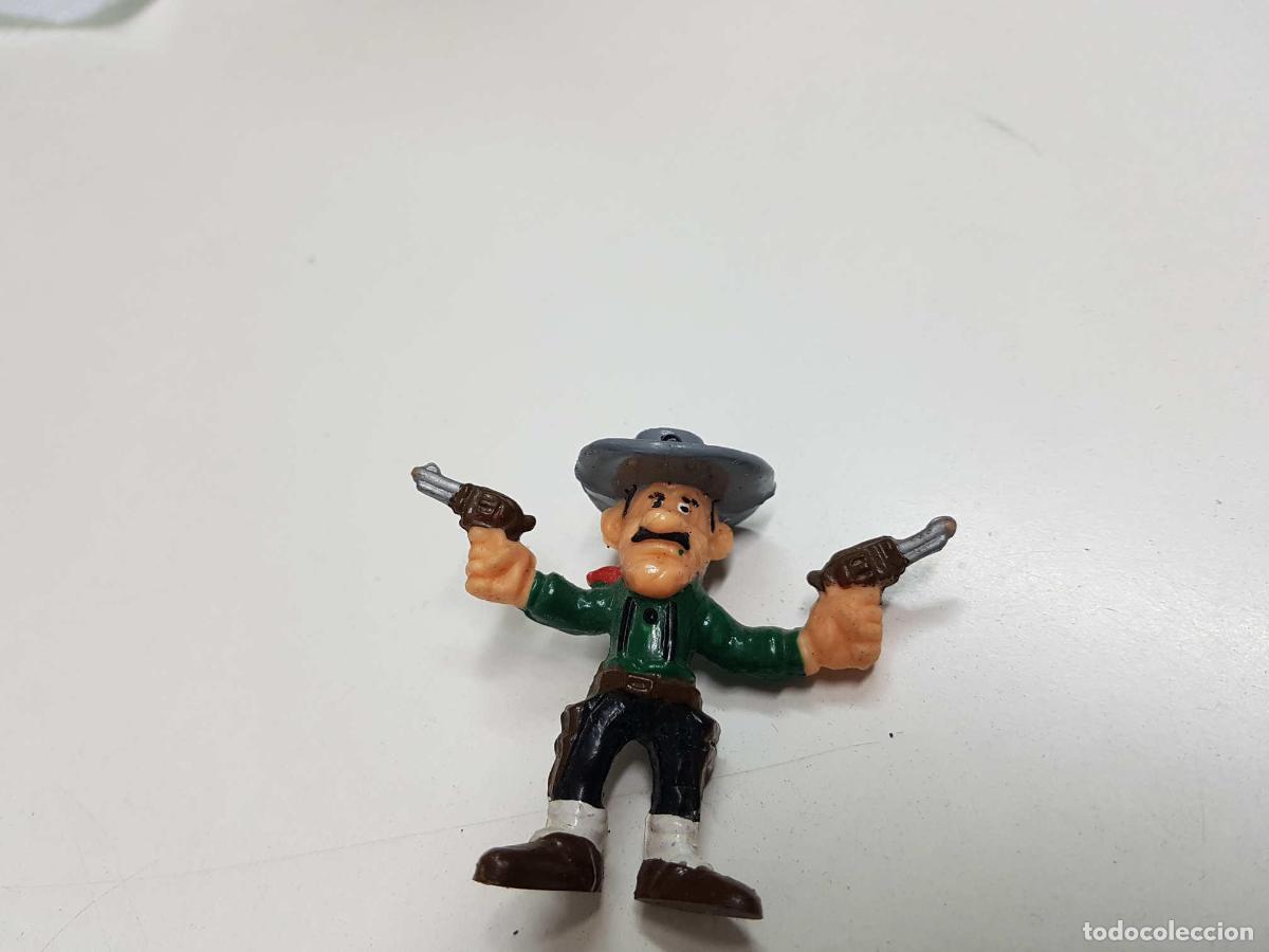 Collectionnisme de Revues et Journaux: Figura de uno de los hermanos Dalton, enarbolando dos pistolas