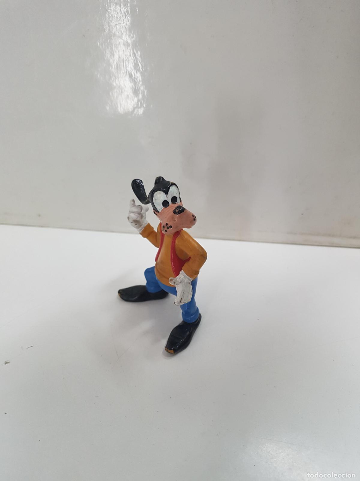 Collection Magazines and Newspapers: Figura de personajes de Disney: Goofy, camiseta naranja