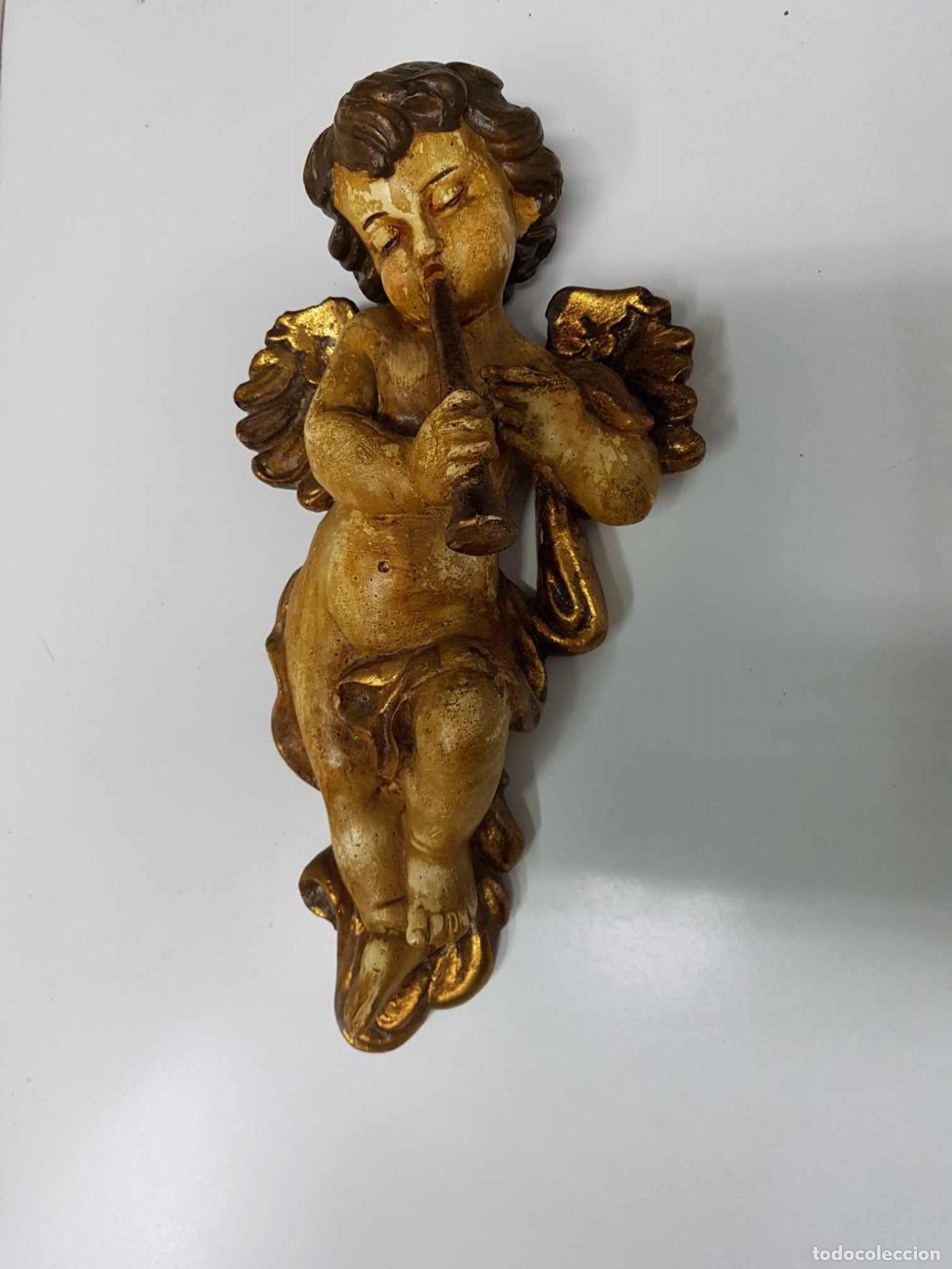 Coleccionismo de Revistas y Peri&oacute;dicos: Figura de Querubin tocando un instrumento de aire