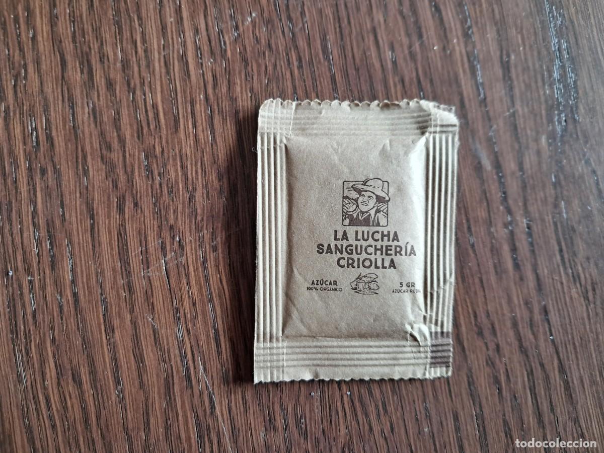 Sobres de az&uacute;car de colecci&oacute;n: sobre de az&uacute;car rubia,vac&iacute;o publicitario, cadena de restaurantes la lucha sangucher&iacute;a criolla, Per&uacute;.