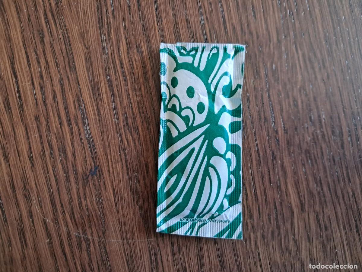 Sobres de az&uacute;car de colecci&oacute;n: sobre de az&uacute;car vac&iacute;o, verde y blanco.