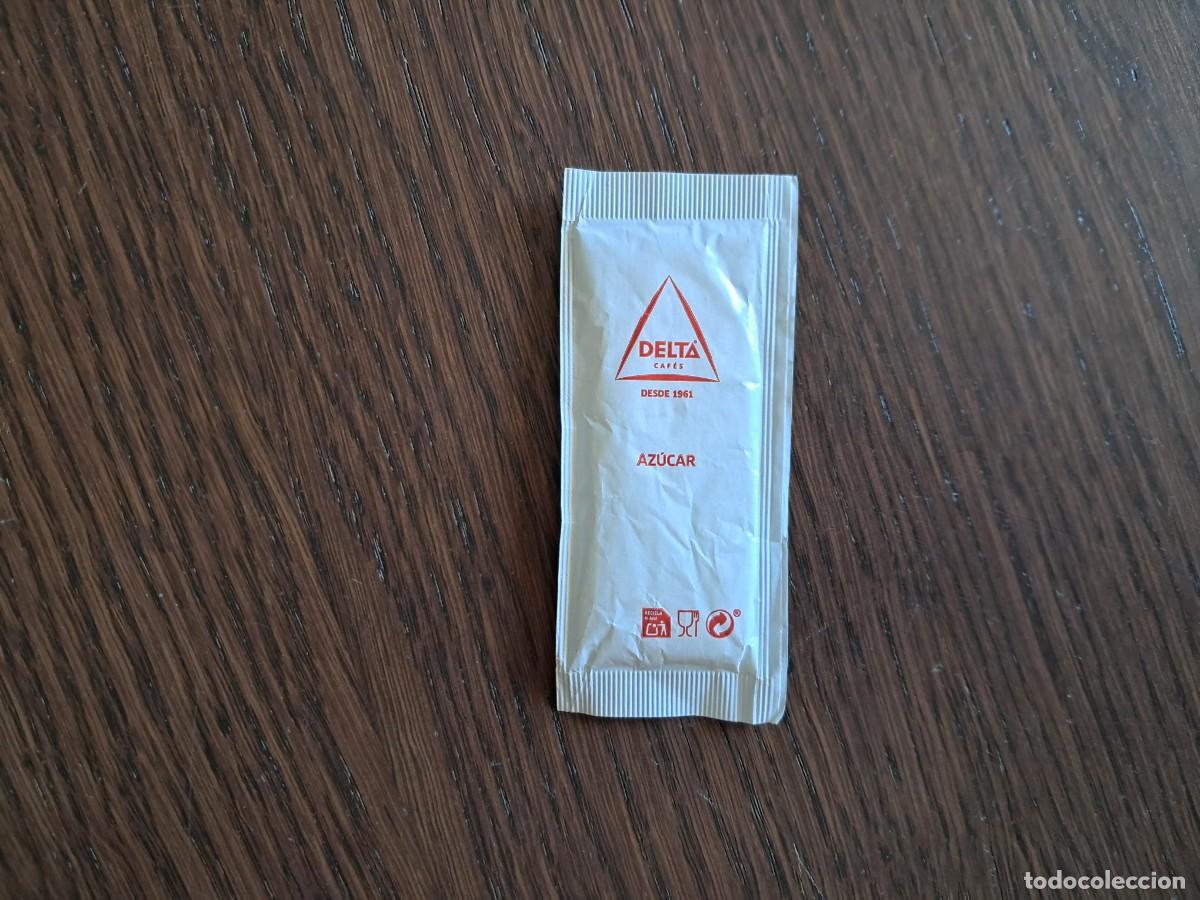 Sobres de az&uacute;car de colecci&oacute;n: sobre de az&uacute;car vac&iacute;o publicitario, Delta caf&eacute;s.