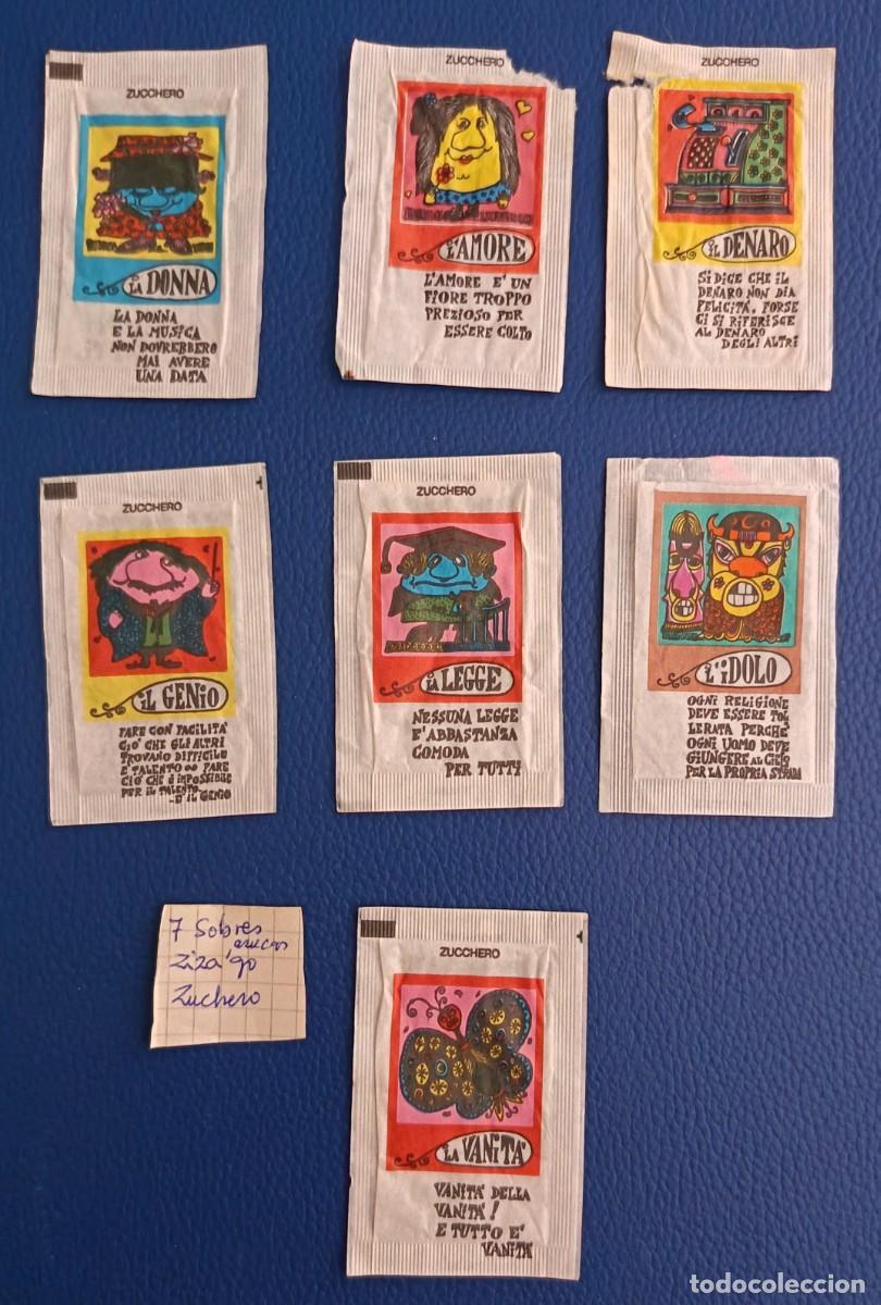 Sobres de az&uacute;car de colecci&oacute;n: 7 Sobres de azucar. ZIZA'GO. Zuchero. Coleccion. Uno abierto como un libro.