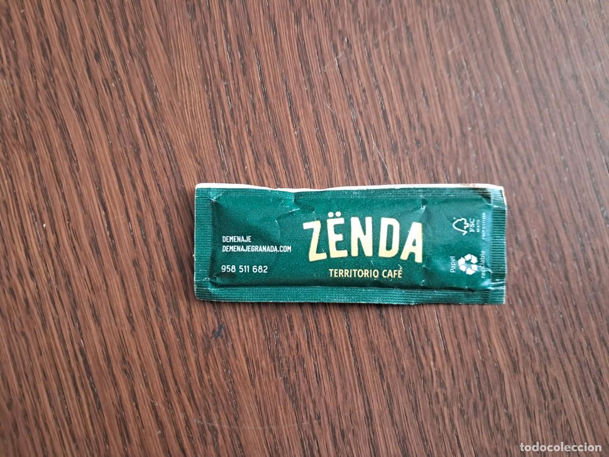 Sobres de az&uacute;car de colecci&oacute;n: sobre de az&uacute;car vac&iacute;o publicitario, Z&euml;nda territorio caf&eacute;, grupo malicia. Granada.