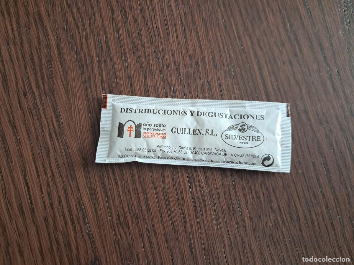 Sobres de az&uacute;car de colecci&oacute;n: sobre de az&uacute;car vac&iacute;o publicitario, distribuciones Guill&eacute;n SL, caf&eacute;s Silvestre, Murcia. frase dorso.