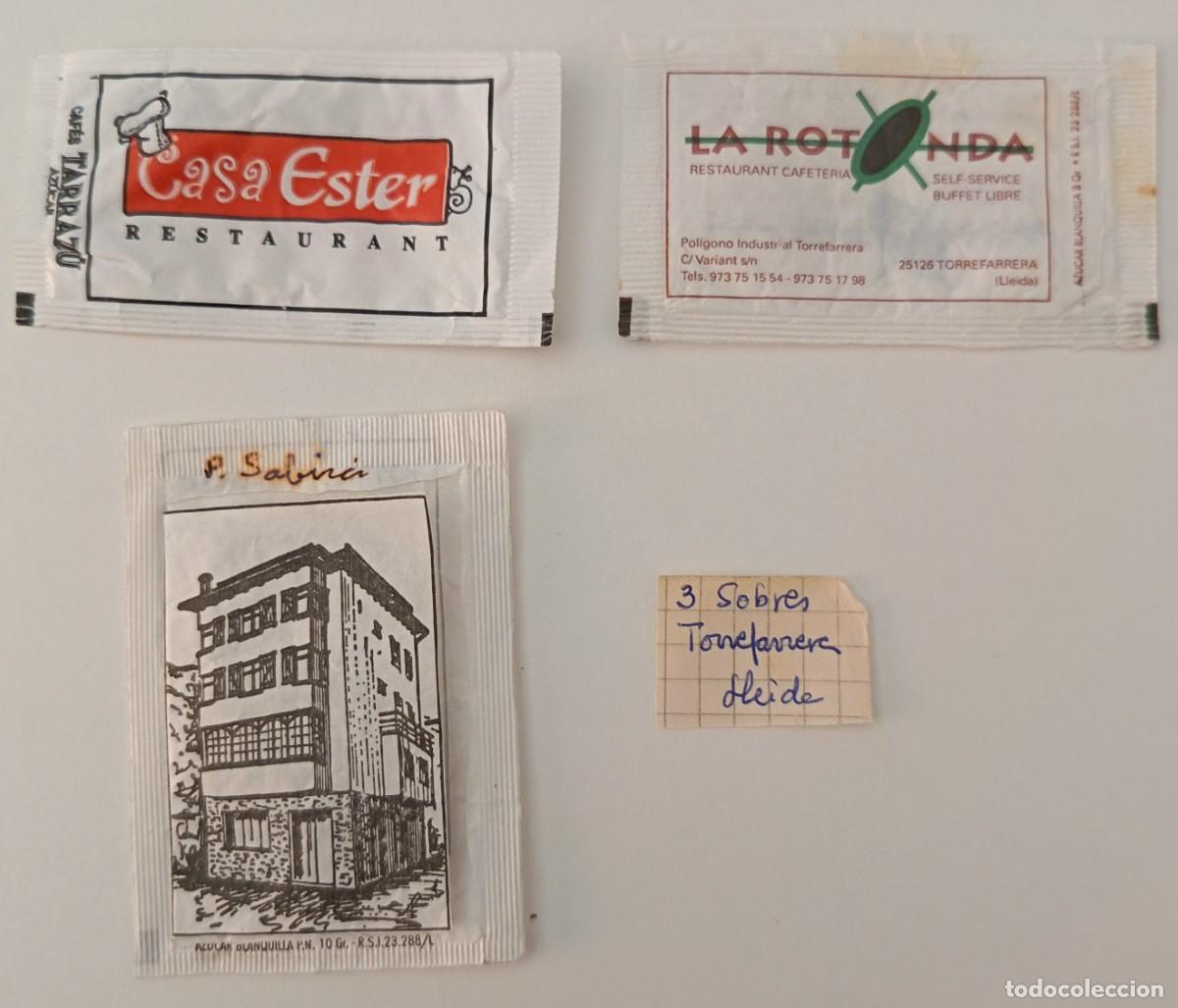 Sammlung von Zuckerbeuteln: Sobres de azucar. 3 Sobres de azucar Torrefarrera. Lleida. Dos abiertos como un libro.