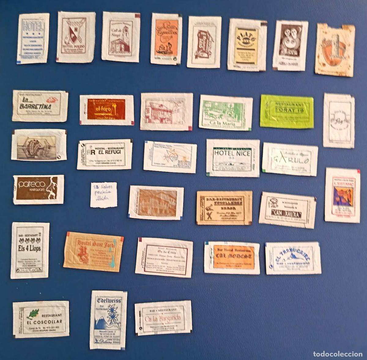 Sammlung von Zuckerbeuteln: Sobres de azucar. 32 Sobres de azucar. Provincia de Lleida. 9 Abiertos como un libro.
