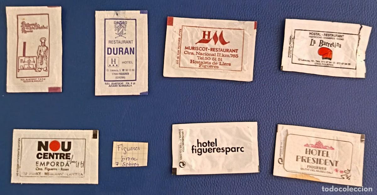 Sobres de az&uacute;car de colecci&oacute;n: Sobres de azucar. 7 Sobres de azucar. Figueres. Girona. Uno abierto como un libro.