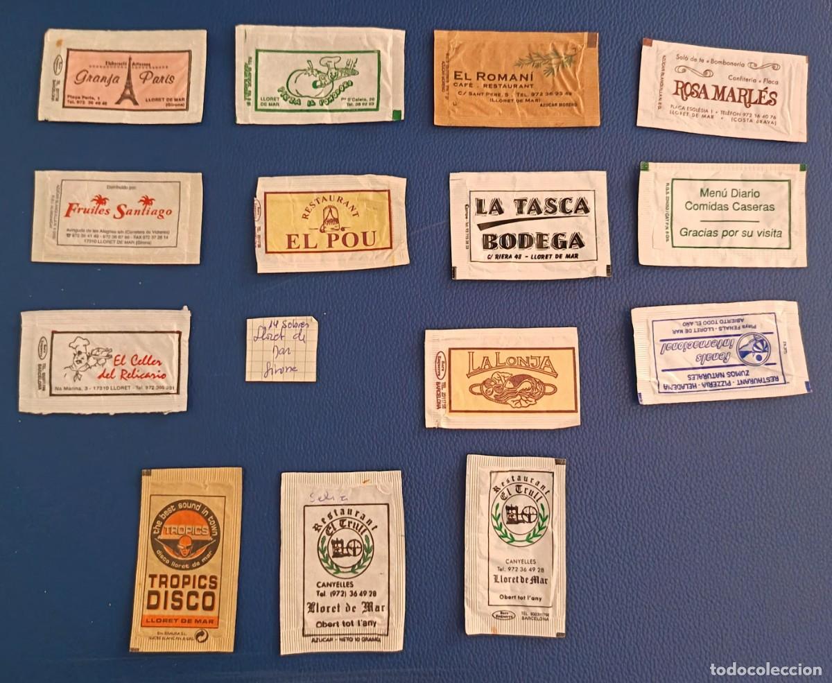 Sobres de az&uacute;car de colecci&oacute;n: Sobres de azucar. 14 Sobres de azucar. lloret de Mar. Girona. Uno abierto como un libro.