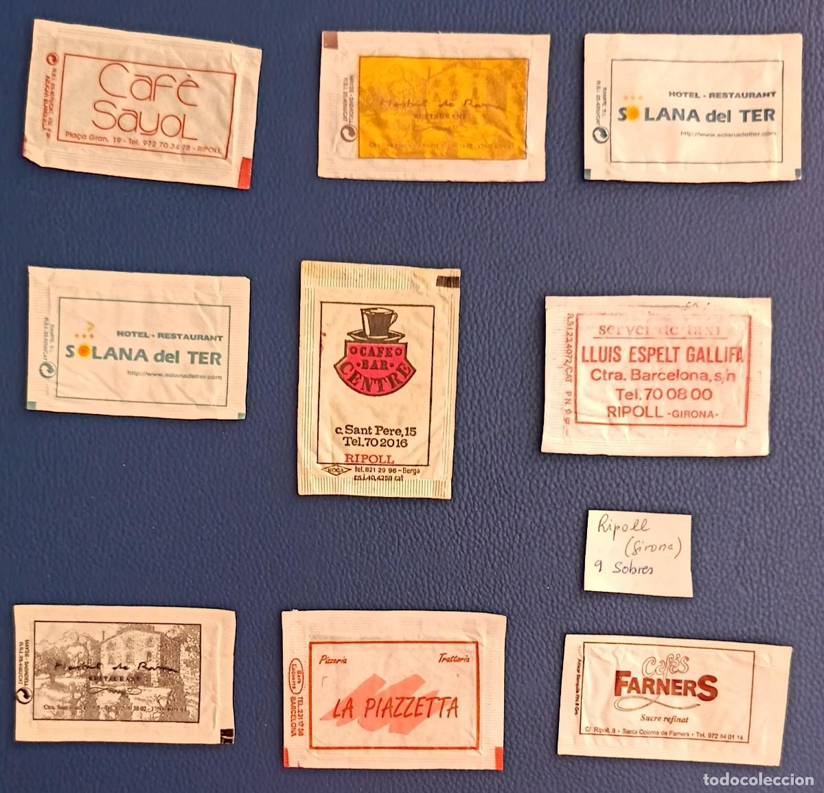 Sobres de az&uacute;car de colecci&oacute;n: Sobres de azucar. 9 Sobres de azucar. Ripoll. Girona. Uno abierto como un libro.