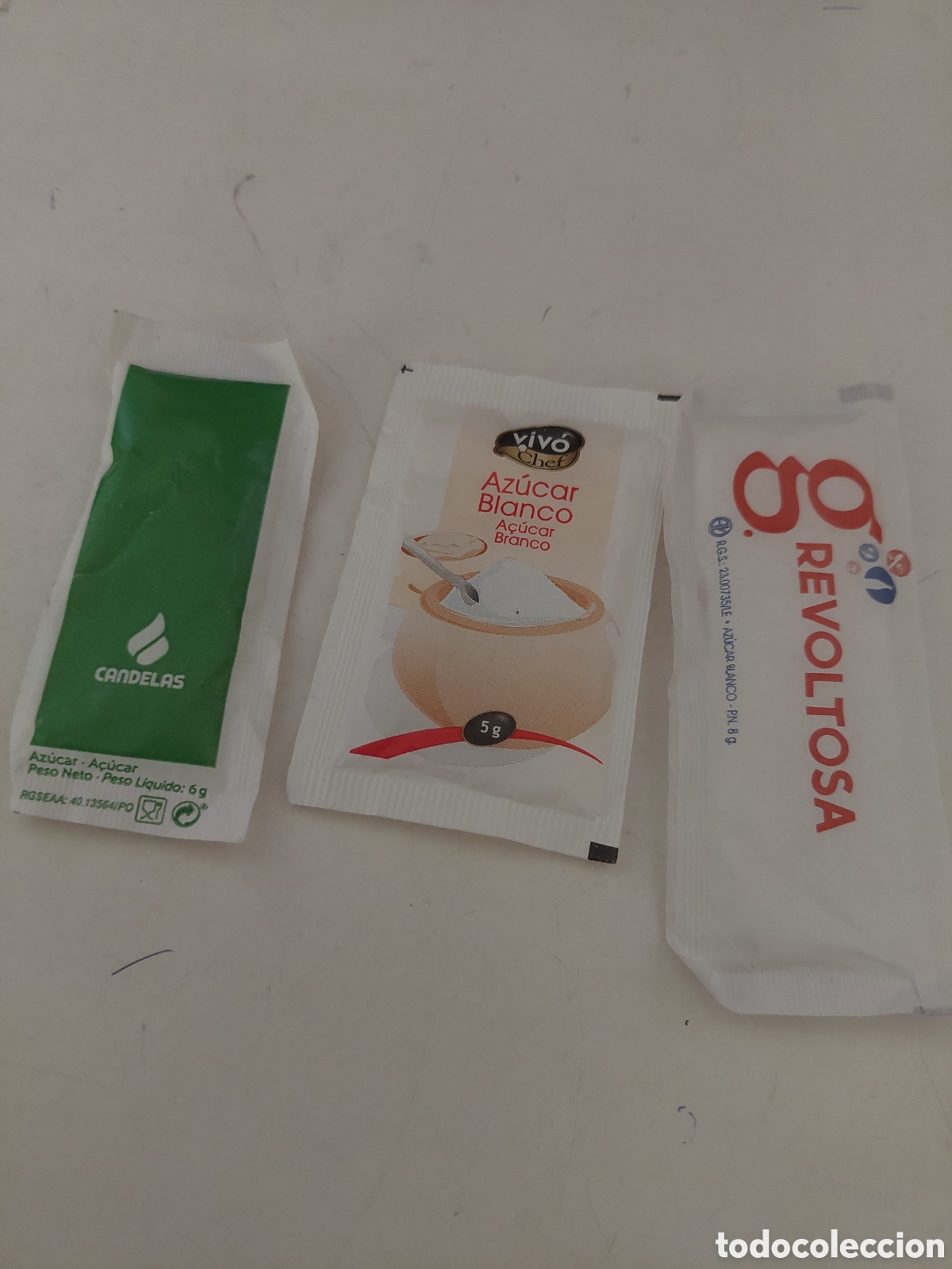 Sobres de az&uacute;car de colecci&oacute;n: Az&uacute;cares llenos candelas, vivo,revoltosa