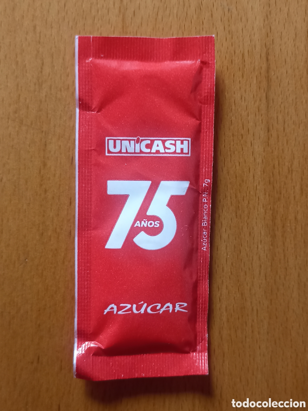 Sobres de az&uacute;car de colecci&oacute;n: 1 azucarillo lleno - Unicash 75 a&ntilde;os - Pedido m&iacute;nimo 3&euro;