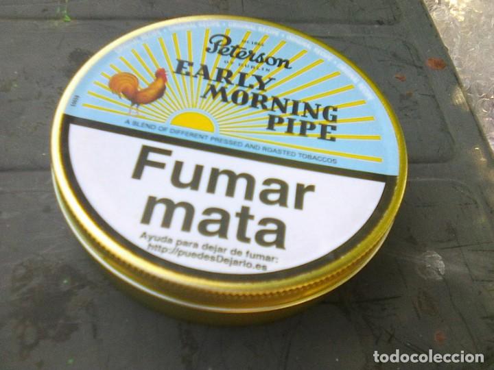 hand rolling tobacco near me Golden Virginia and Old Holborn hand rolling tobacco packs with Greek  health warnings displayed in an airport duty paid store. Smoking product  display Stock Photo
