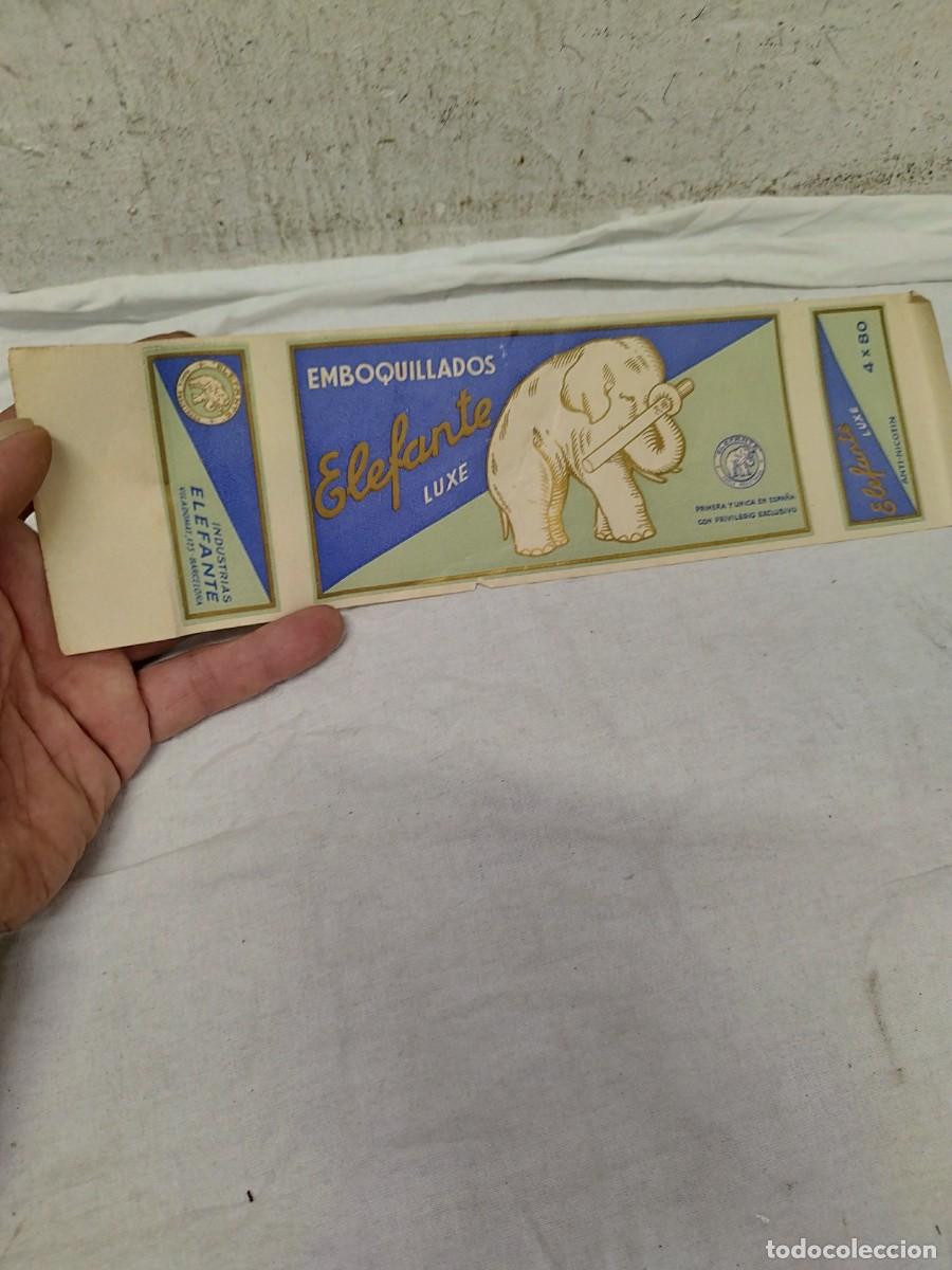 Paquetes de tabaco: Antigua etiqueta faja de Emboquillados Elefante Luxe - Industrias Elefante Barcelona.