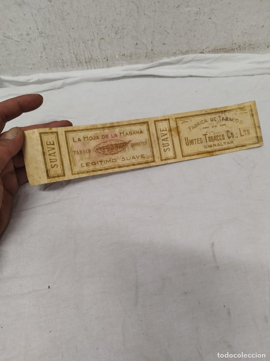Paquetes de tabaco: Antigua faja precinto de tabaco La Hoja de La Habana - United Tobacco Co. Ltd. Gibraltar. Cuba.
