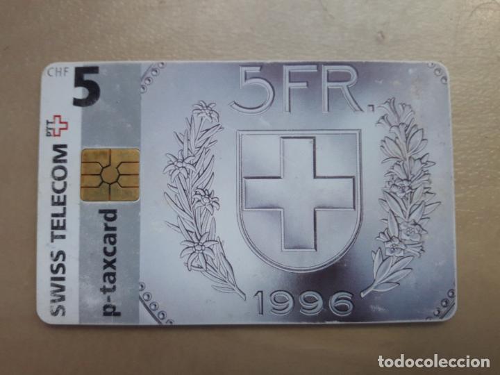 Sammlung von Telefonkarten: TARJETA TELEFONICA SUIZA SWISS TELECOM P-TAXCARD 5 FRANCOS DIBUJO MONEDA NUMIMASTICA1998 USADA