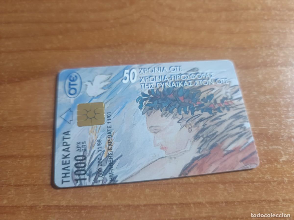 Tarjetas telef&oacute;nicas de colecci&oacute;n: tarjeta telefonica - Dise&ntilde;o con paloma y figura femenina.. GRIEGA