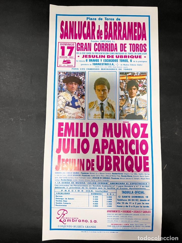 Stierkampf: CARTEL. TOROS. PLAZA DE SANL&Uacute;CAR DE BARRAMEDA. 1991. EMILIO MU&Ntilde;OZ.JULIO APARICIO. JESULIN DE UBRIQUE