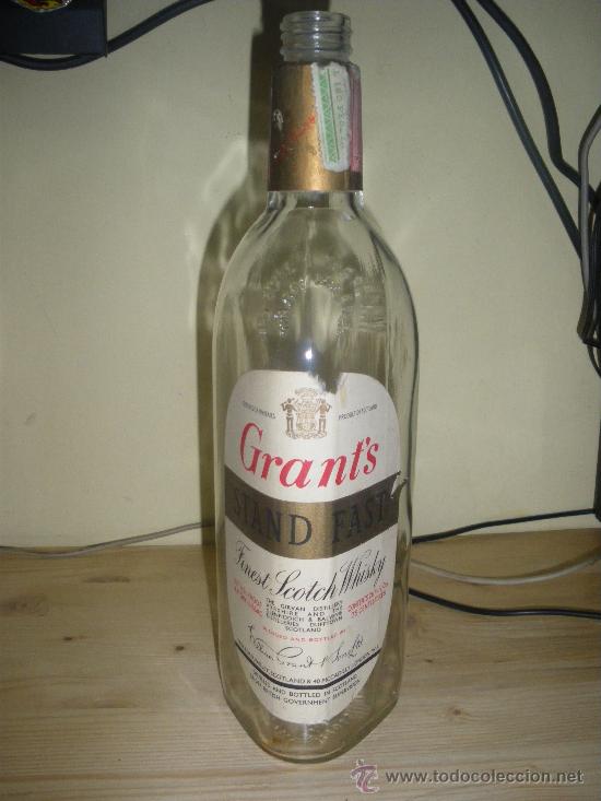 Collection of wines and liquors: ANTIGUA BOTELLA DE WHISKY IMPORTADA, GRANT`S STAND FAST.