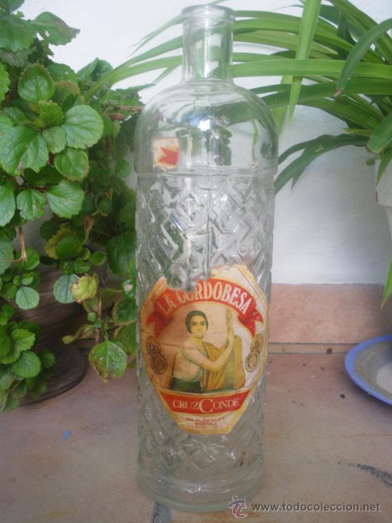 Sammlung von Weinen und Lik&ouml;ren: BOTELLA Y TARJETA POSTAL DE ANIS LA CORDOBESA. CRUZ CONDE, MIGUEL BAENA SA, MONTILLA.. CORDOBA.