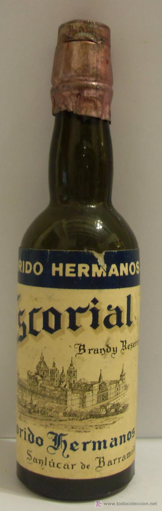 Collection of wines and liquors: BOTELLIN DE BRANDY RESREVA ESCORIAL. BODEGA FLORIDO HERMANOS. SANLUCAR DE BARRAMEDA, CADIZ.