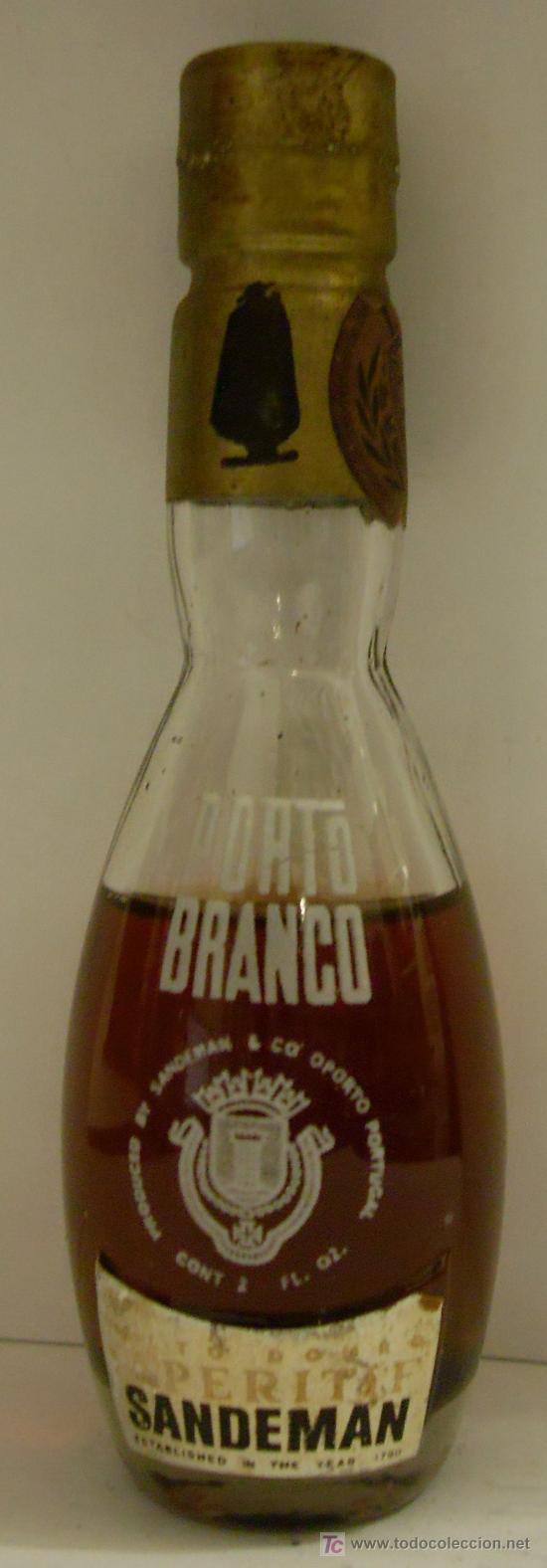 Sammlung von Weinen und Lik&ouml;ren: BOTELLIN DE VINO DE OPORTO PORTO BRANCO. BODEGAS SANDEMAN. JEREZ DE LA FRONTERA, CADIZ..